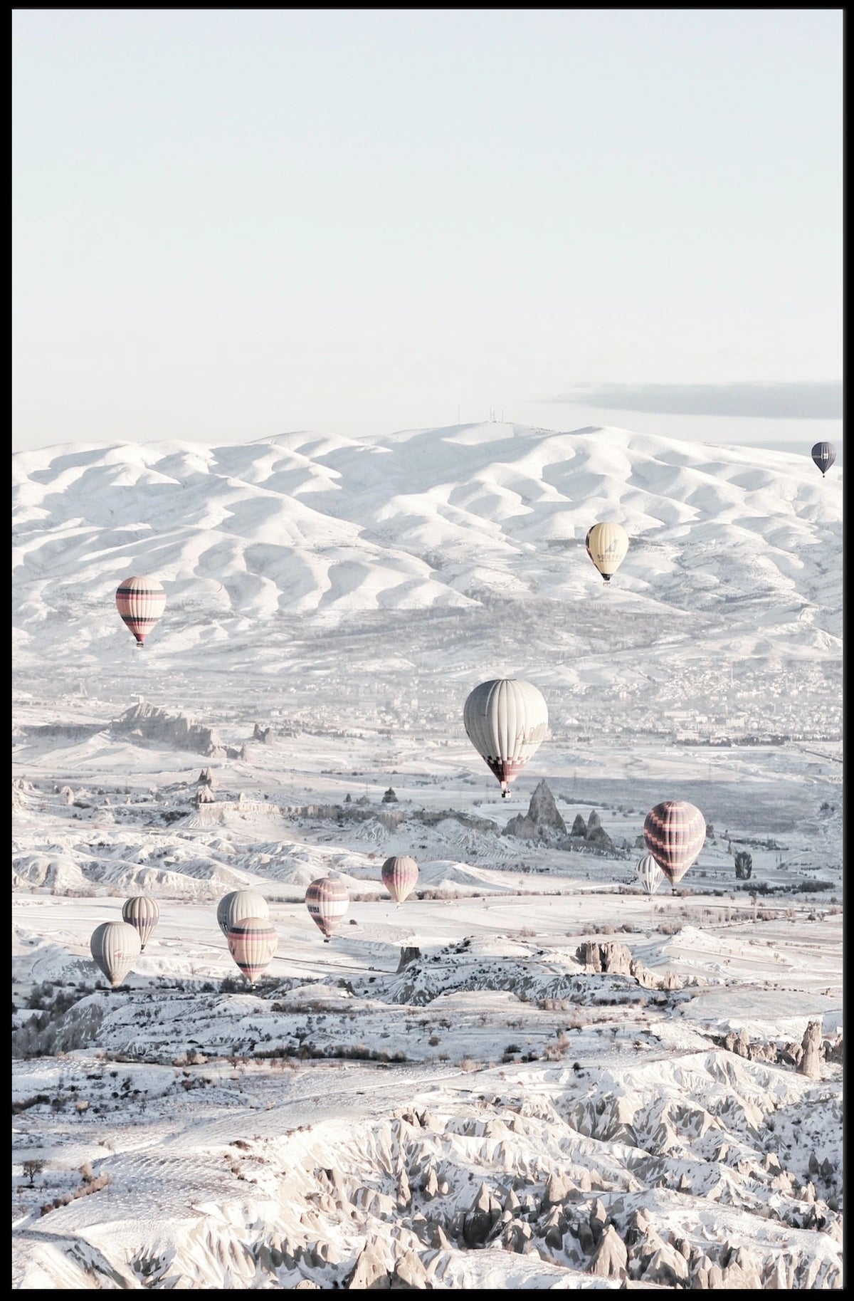 Serene Hot Air Balloons Over Snowy Landscape Travel Poster