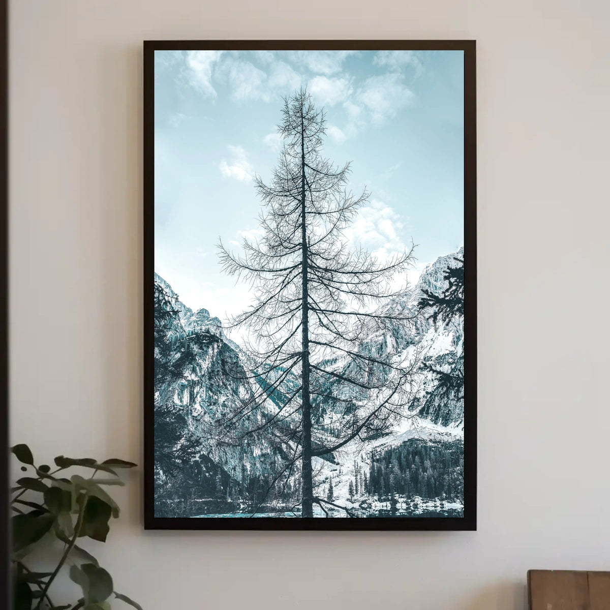 Majestic Winter Tree Against Mountain Landscape Poster