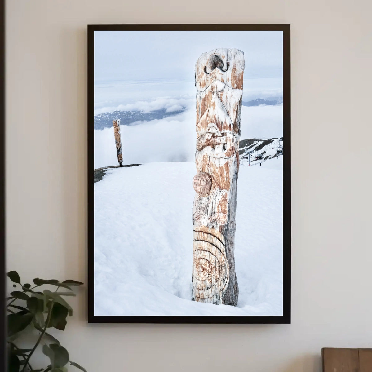 Snow-Covered Totem Poles Poster