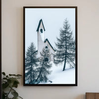 Serene Winter Chapel in Snowy Alpine Landscape