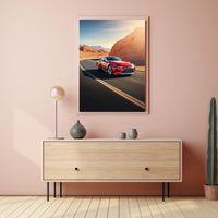 Sleek Red Sports Car on Desert Highway Poster PosterGoat