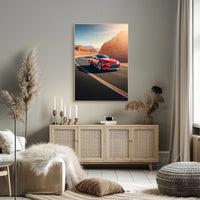 Sleek Red Sports Car on Desert Highway Poster PosterGoat