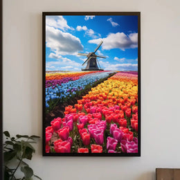 Charming Dutch Windmill in Blooming Tulip Fields Poster PosterGoat