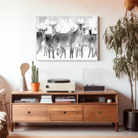 Deer Gathering Winter Wonderland Black and White Animal Poster PosterGoat