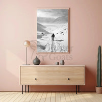 Lone Adventurer Amidst Snowy Peaks Travel Poster PosterGoat