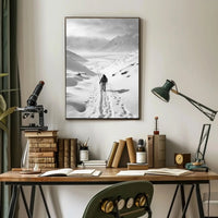 Lone Adventurer Amidst Snowy Peaks Travel Poster PosterGoat