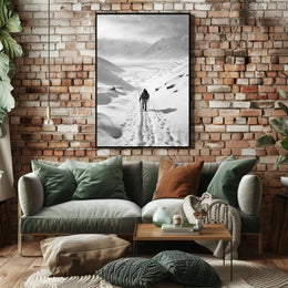Lone Adventurer Amidst Snowy Peaks Travel Poster PosterGoat