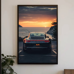 Luxury Sports Car Sunset Coastal Road Poster PosterGoat