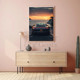 Luxury Sports Car Sunset Coastal Road Poster PosterGoat