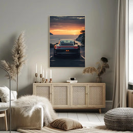 Luxury Sports Car Sunset Coastal Road Poster PosterGoat