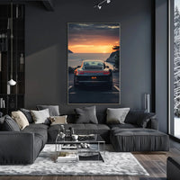 Luxury Sports Car Sunset Coastal Road Poster PosterGoat