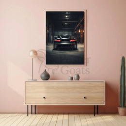 Sleek Modern Sports Car in Industrial Warehouse Poster PosterGoat