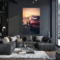 Sleek Red Sports Car Sunset Scene Artistic Poster PosterGoat