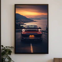 Sleek Sports Car Coastal Road Adventure Artistic Poster PosterGoat