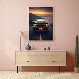 Sleek Sports Car Coastal Road Adventure Artistic Poster PosterGoat