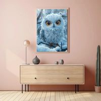 Stylized Snowy Owl on Branch Winter Animal Poster PosterGoat