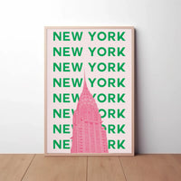Vibrant Chrysler Building in Pink Travel Poster PosterGoat