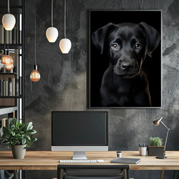 Portrait Of A Black Labrador Puppy Poster PosterGoat