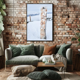 Snow-Covered Totem Poles Poster