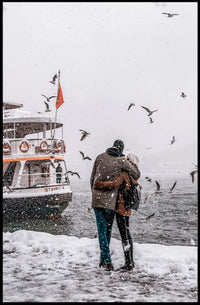 Winter Embrace By The Sea Poster