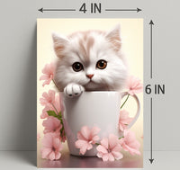Kitten In A Cup Poster PosterGoat