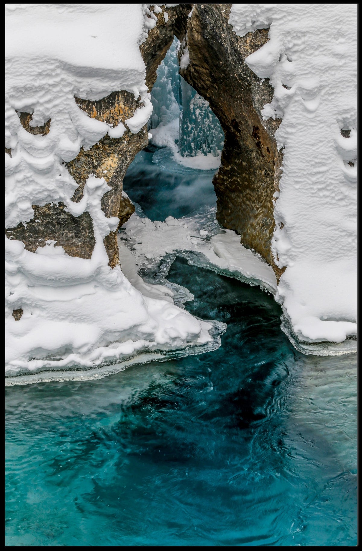Serene Winter River with Icy Archway - National Park Poster