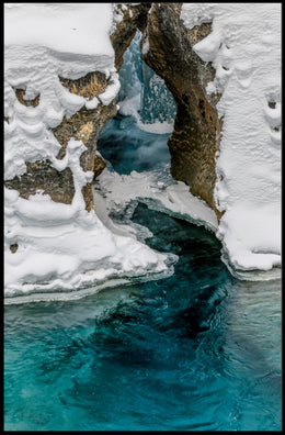 Serene Winter River with Icy Archway - National Park Poster