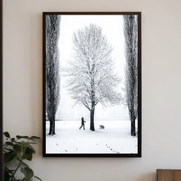 Winter Serenity: Dog Walker in Snowy Landscape