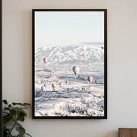 Serene Hot Air Balloons Over Snowy Landscape Travel Poster