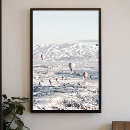 Serene Hot Air Balloons Over Snowy Landscape Travel Poster