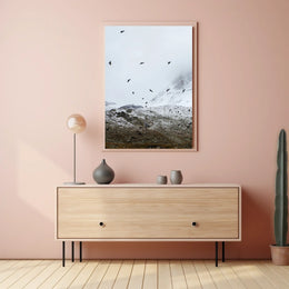 Birds In Flight Over Snowy Peaks Poster