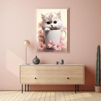 Kitten In A Cup Poster PosterGoat