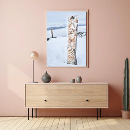 Snow-Covered Totem Poles Poster