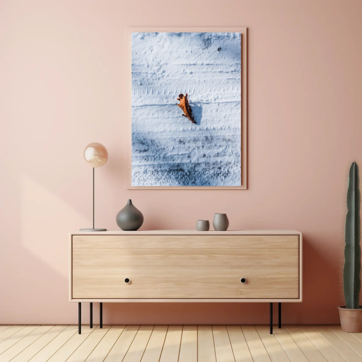 Solitary Leaf On Snow Poster