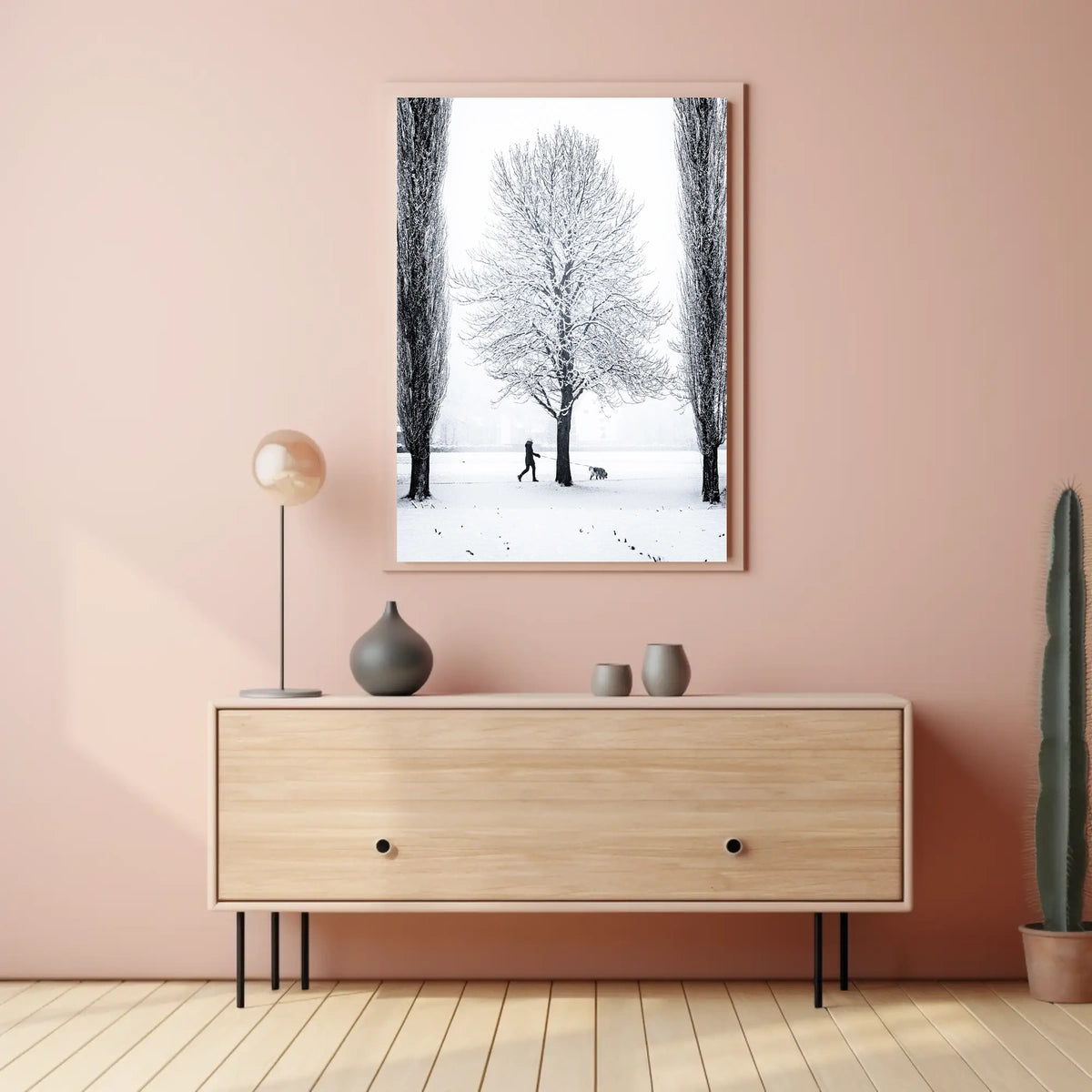 Winter Serenity: Dog Walker in Snowy Landscape