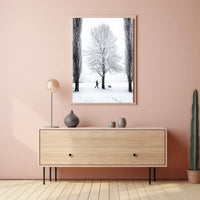 Winter Serenity: Dog Walker in Snowy Landscape