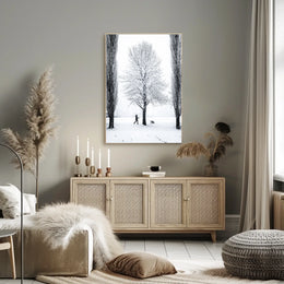 Winter Serenity: Dog Walker in Snowy Landscape