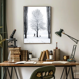 Winter Serenity: Dog Walker in Snowy Landscape