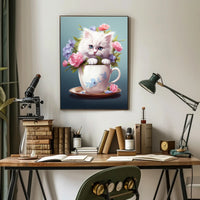 Kitten In A Teacup Poster PosterGoat