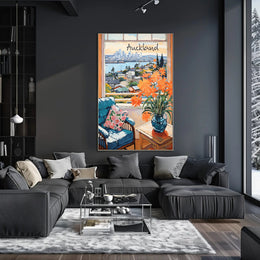 Scenic View of Auckland: Cozy Interior with Blue Armchair and Harbor Poster