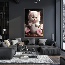 Kitten In A Cup Poster PosterGoat